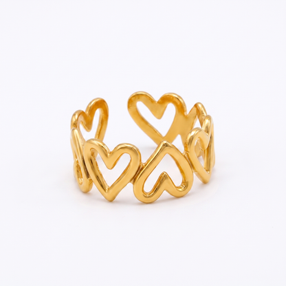 CORA Ring — gold heart band, studio